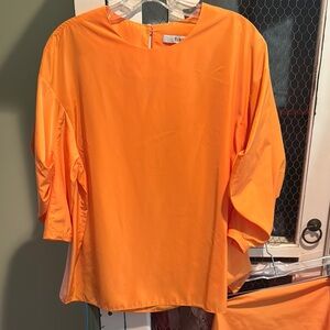 Tibi pleated sleeve sporty nylon top in orange. Size 10. EUC $125